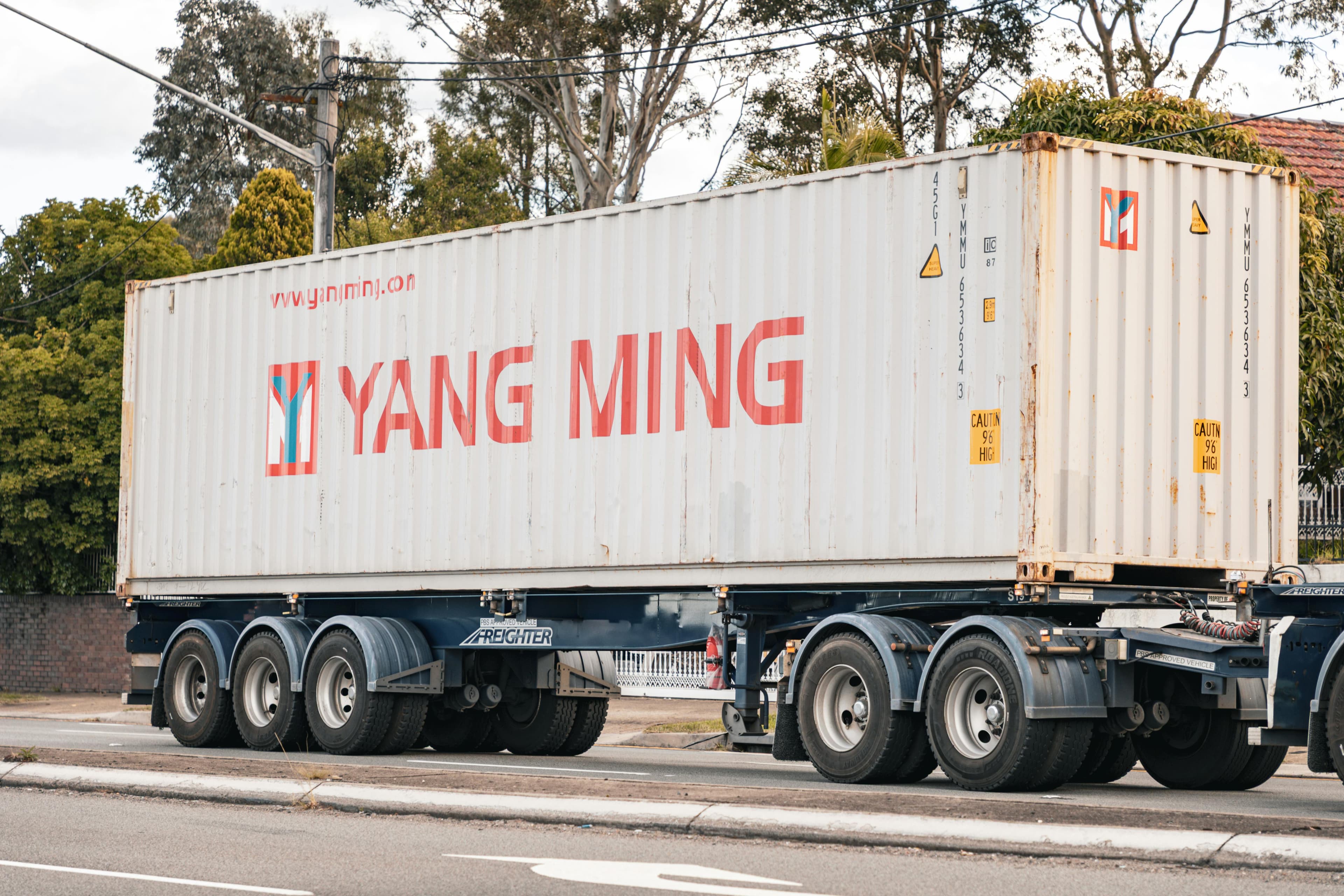 Freight container truck transporting cargo on the road for JointLog road-freight customers